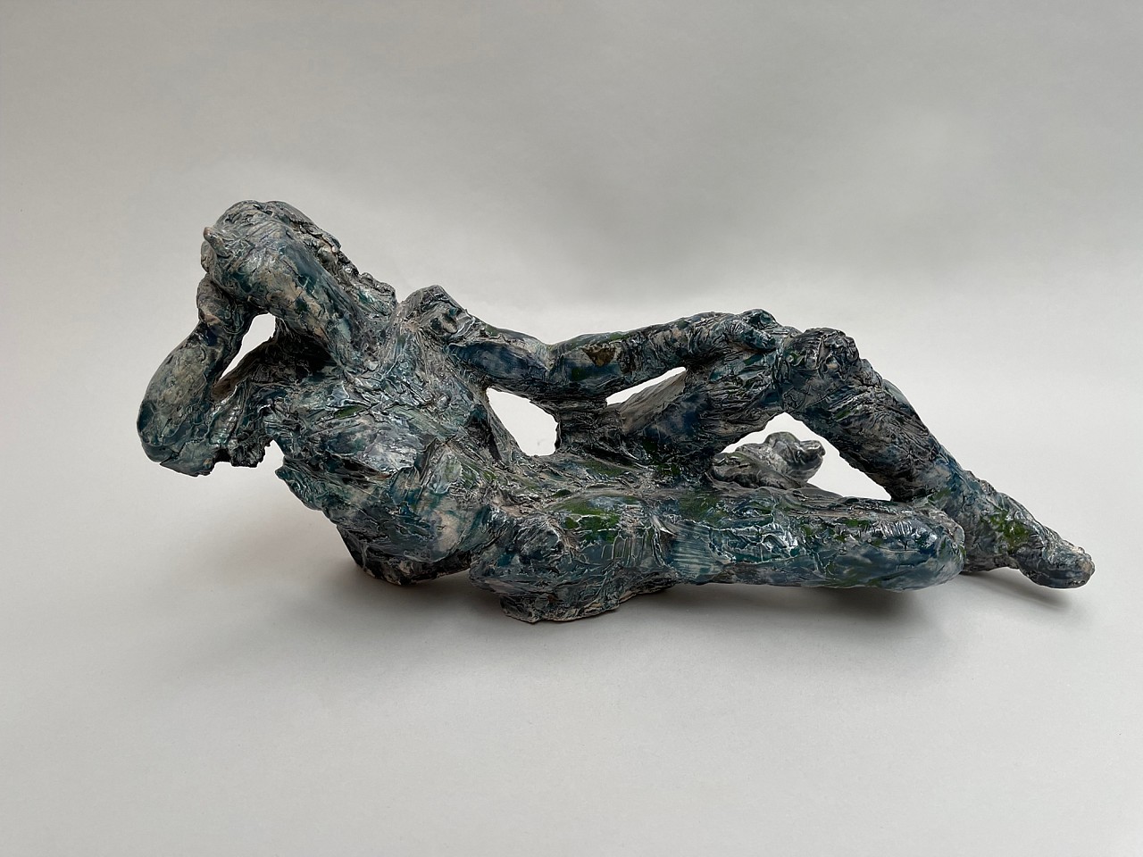 Isabelle Melchior, Reclining Man, 2022
Ceramics dotted with blue enamel, 17"x 7"x 8"
IM 1321
Price Upon Request